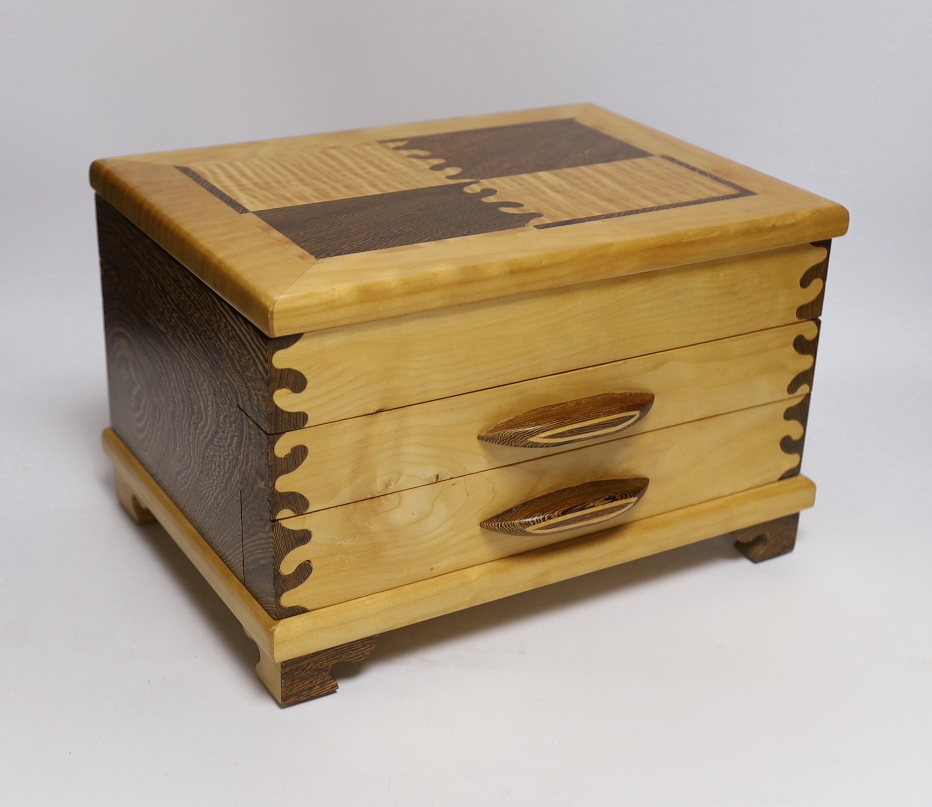 A contemporary maple and wenge jewellery box, by Judd Lotts, 31cm wide, 23cm deep, 20cm high, together with a Victorian banded box